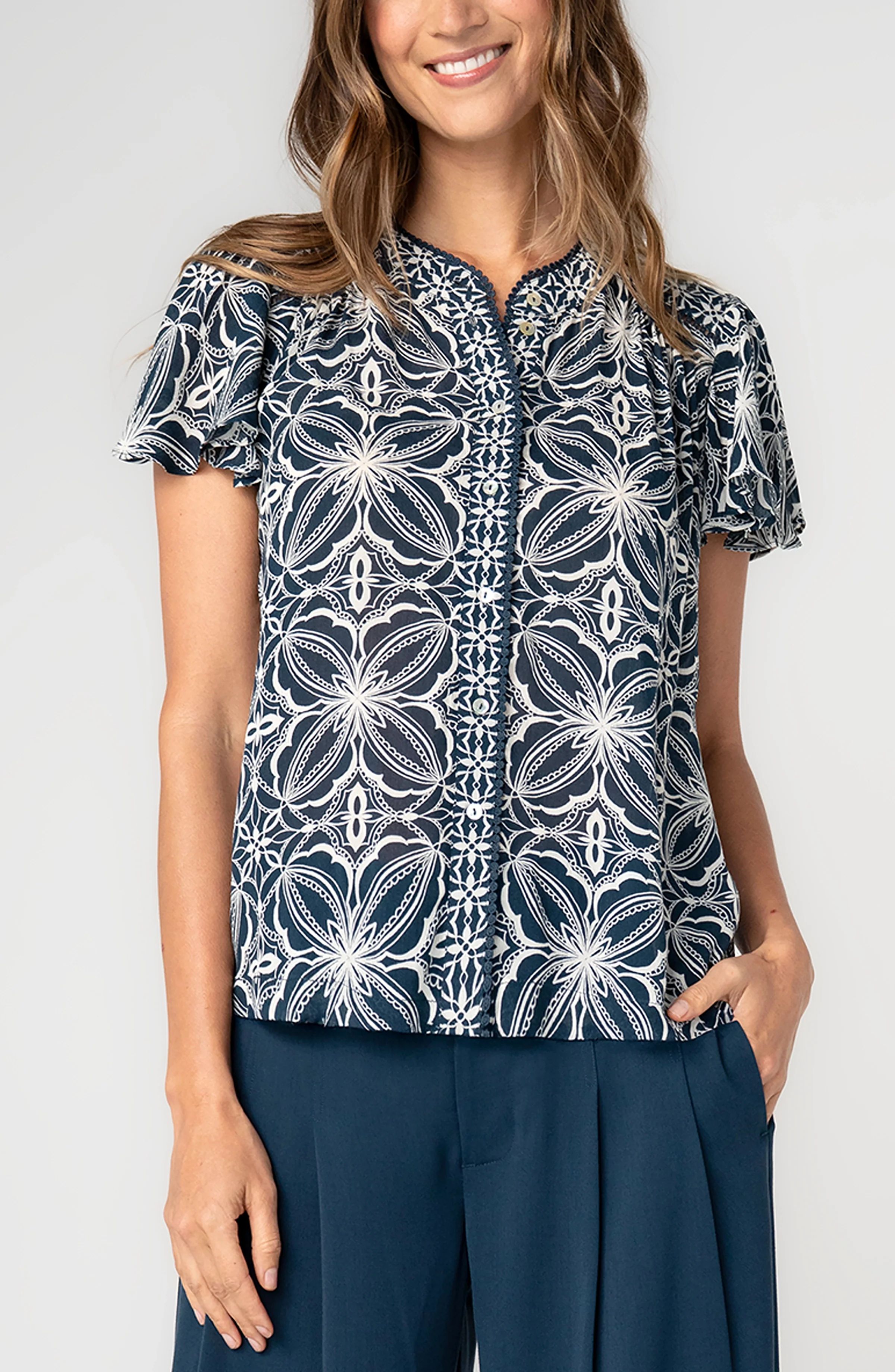 FLUTTER SLEEVE BUTTON FRONT KNIT TOP